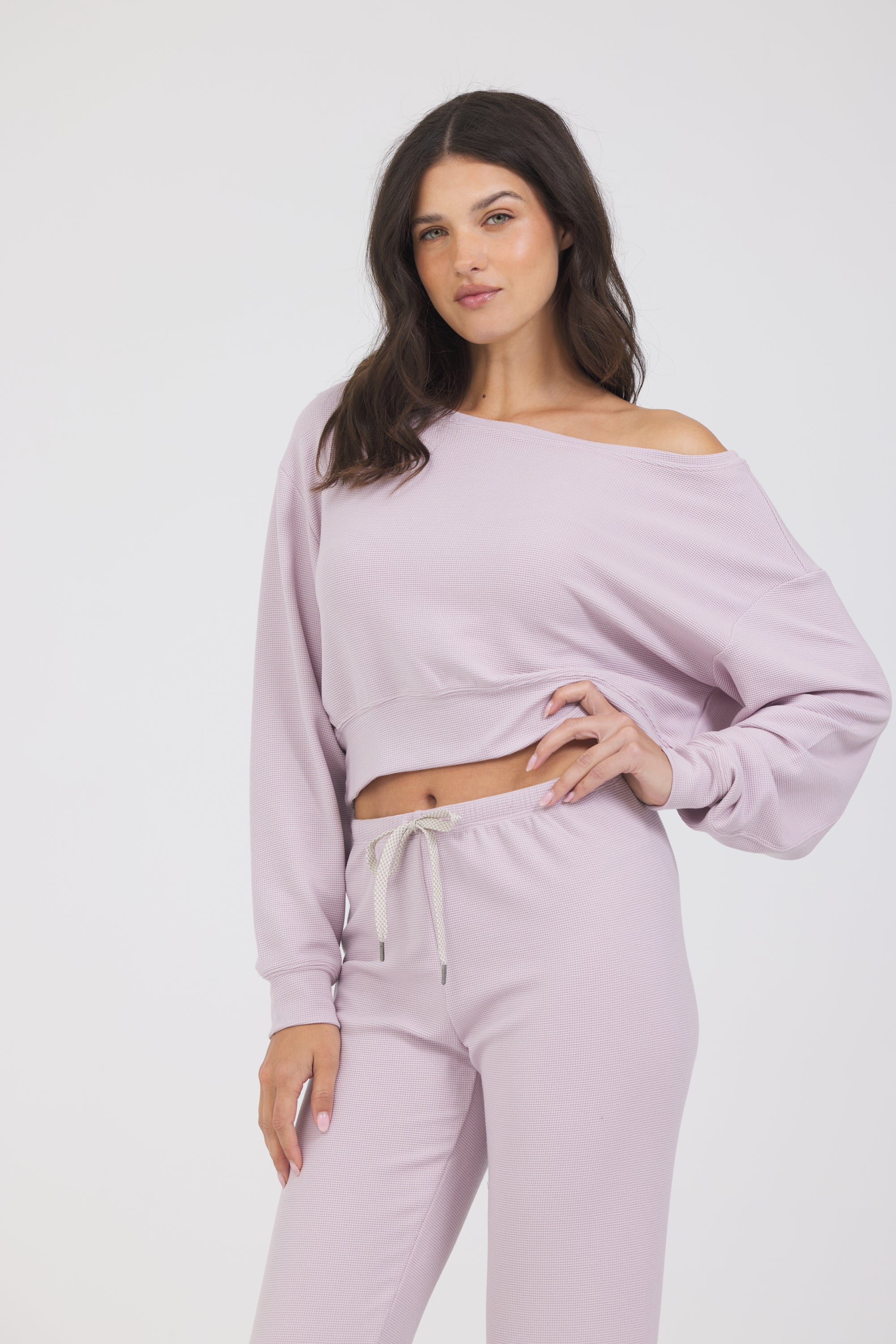 Amiee Off the Shoulder Long Sleeve in dusty pink, modeled with the Delaney joggers from the front
