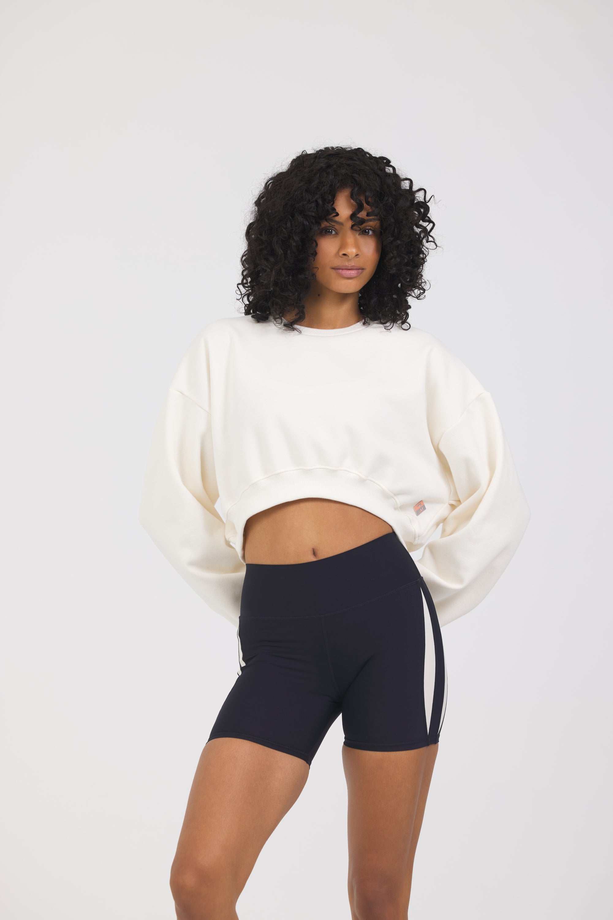 Claire fleece cropped long sleeve in bone, from the front