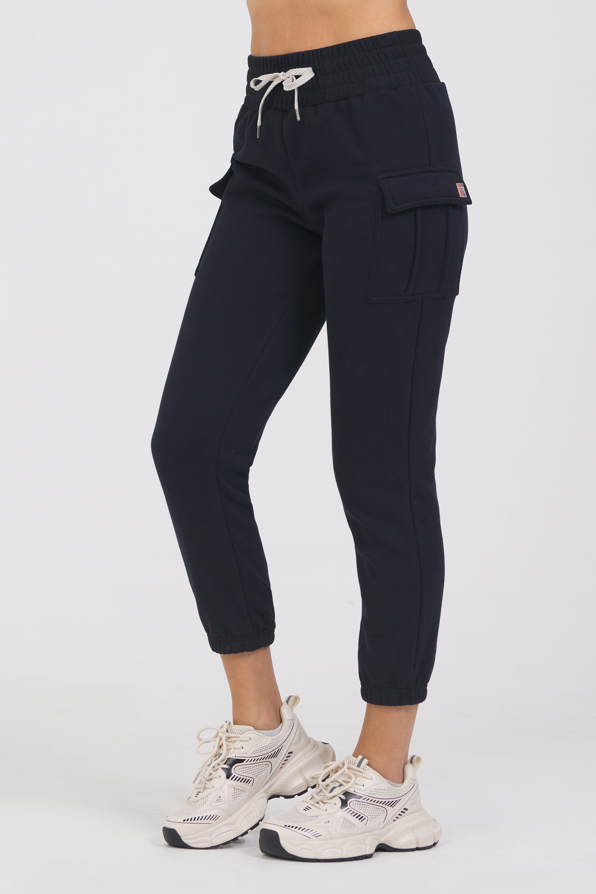 Kim Fleece cargo jogger in black, from the side
