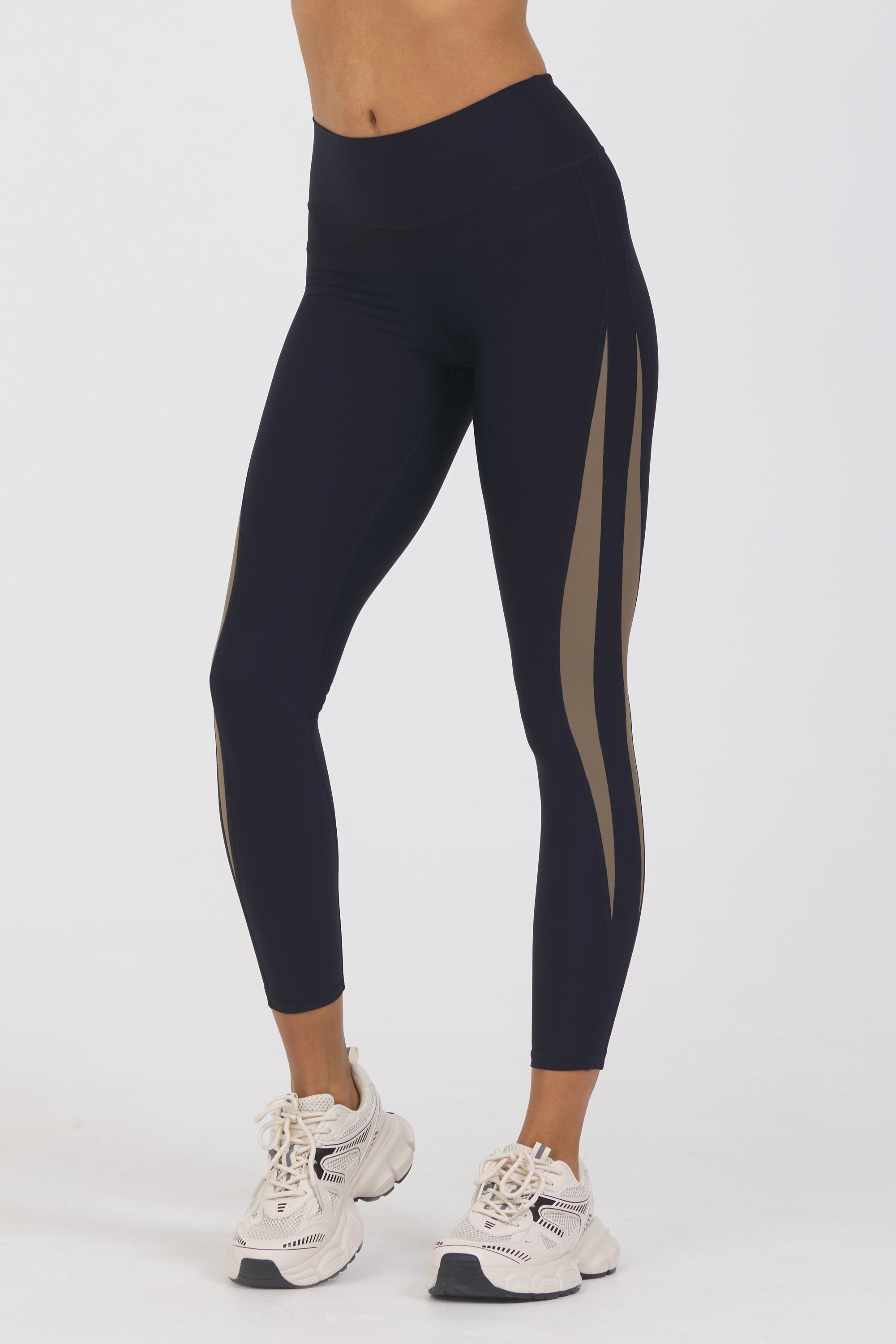 Krista side panel 7/8 leggings in black and truffle, from the side