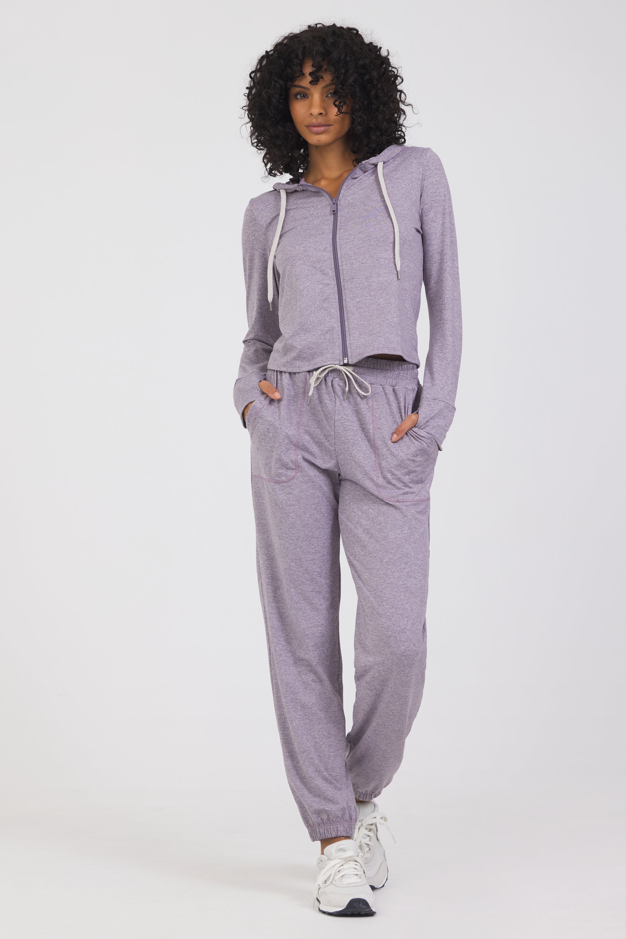 2 Pocket lounge jogger with elasticized waistband and drawstring in dark haze, from the front