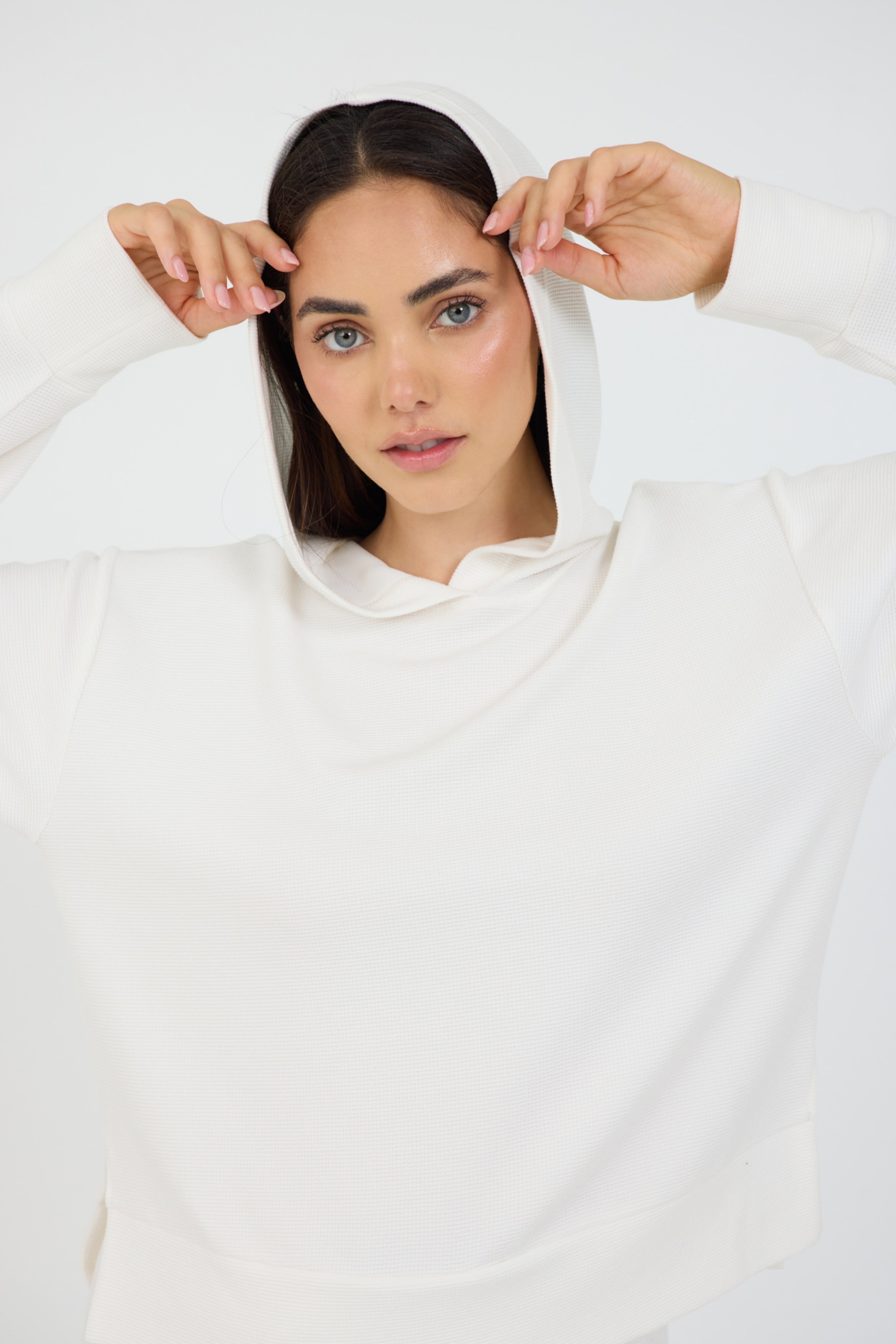 Lynn pullover hoodie with long sleeves in coconut cream, from the front