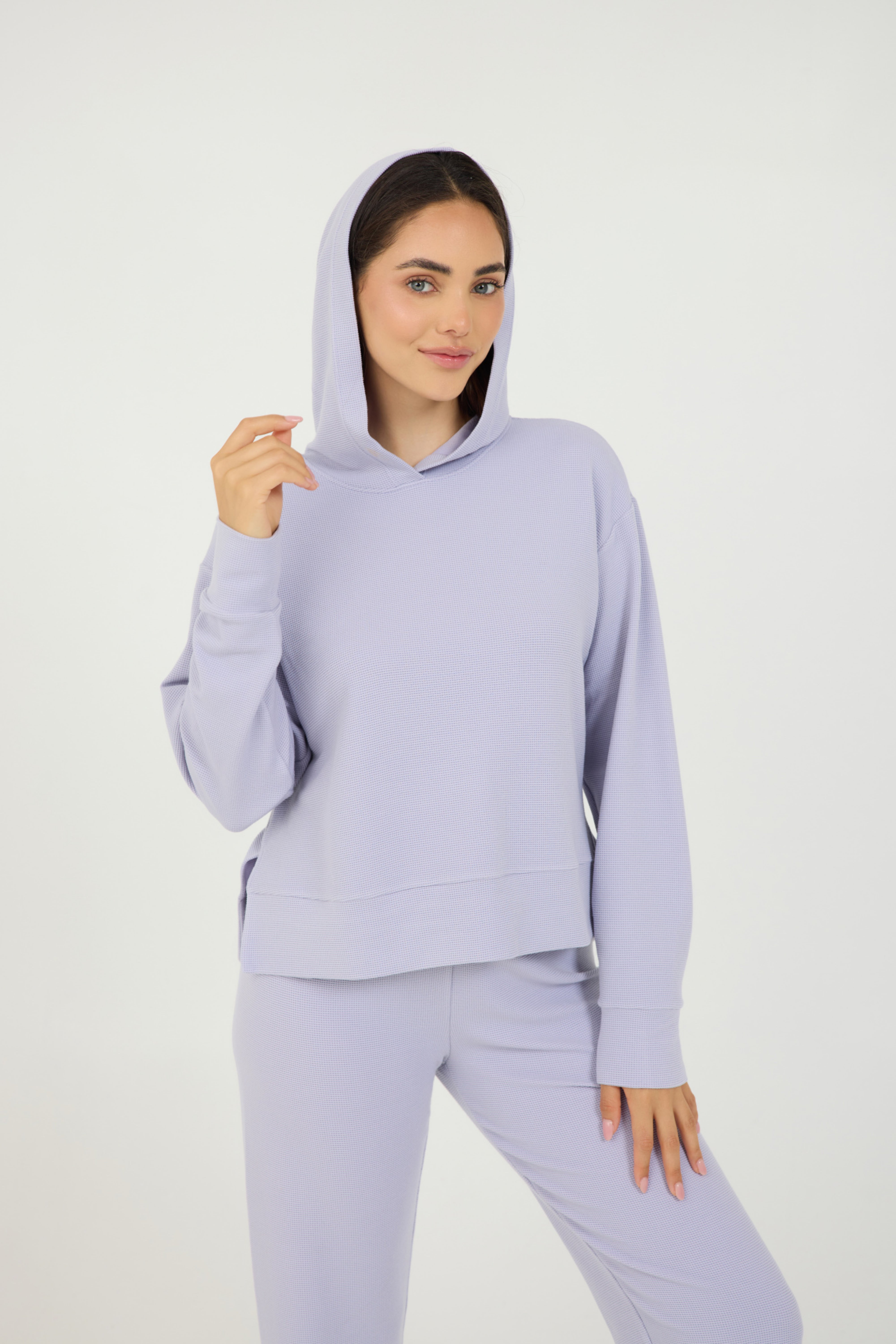Lynn pullover hoodie with long sleeves in light amethyst, modeled with the Delaney joggers from the front
