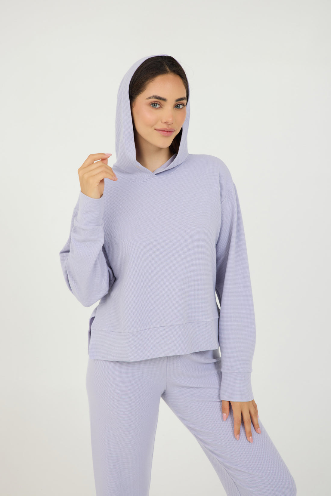 Lynn pullover hoodie with long sleeves in light amethyst, modeled with the Delaney joggers from the front