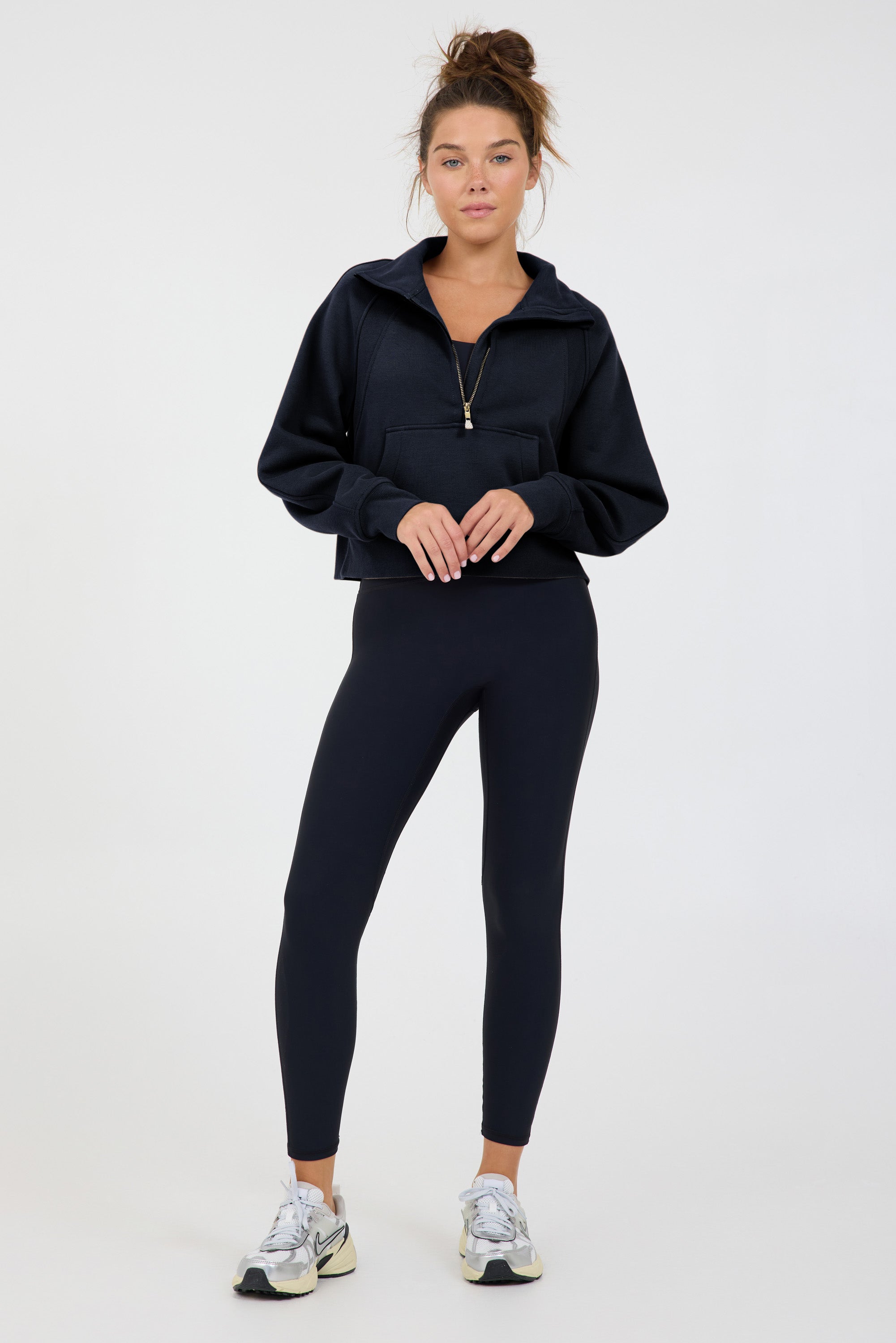 Morgan Fleece half zip long sleeve in black, modeled with the Lori Fleece joggers from the front