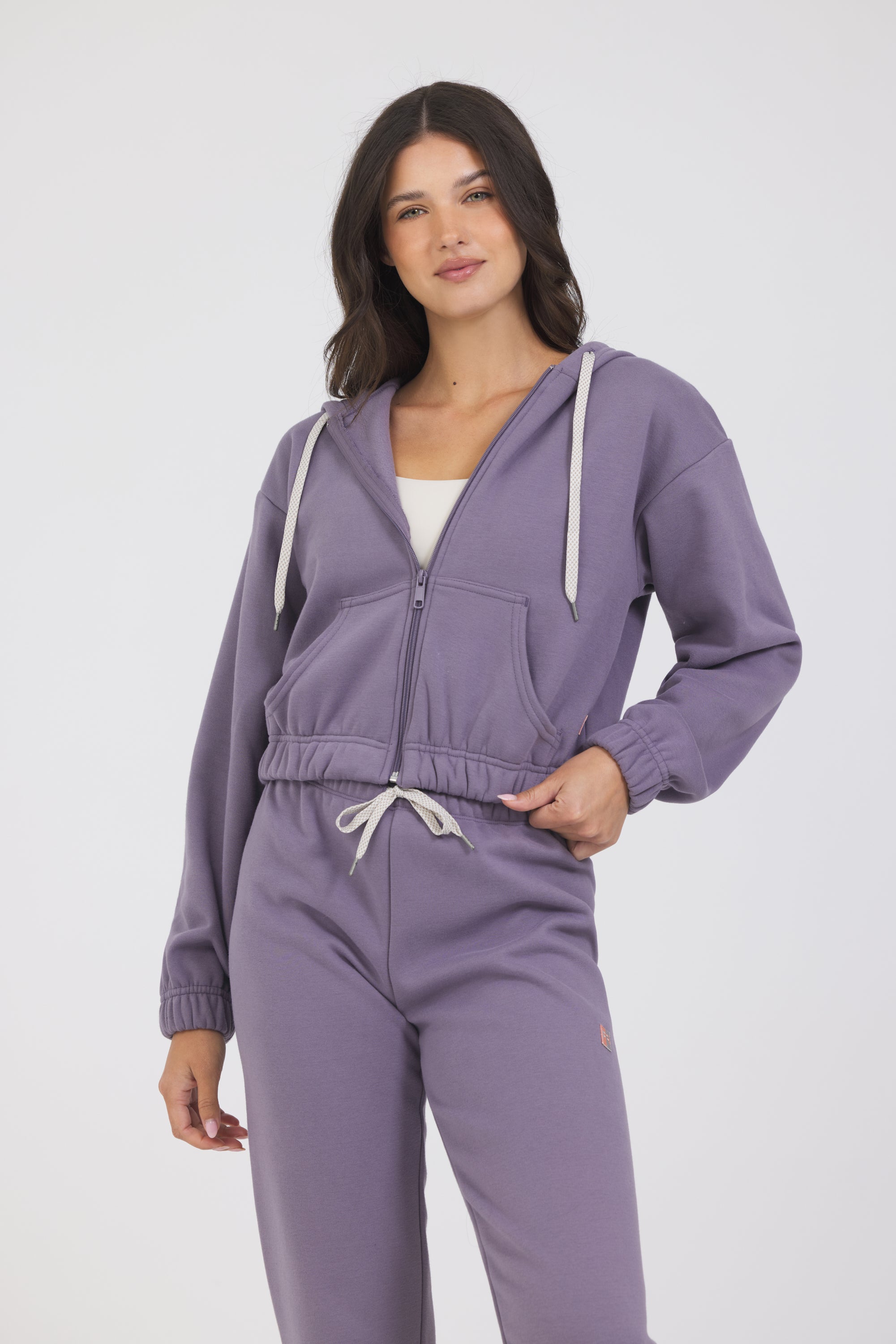 Nicole Fleece zipped cropped hoodie in dark haze, modeled with the Lori fleece joggers from the front