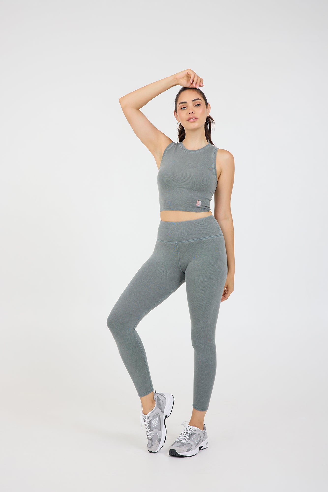 Rib 7/8 legging in teal, posed from the front