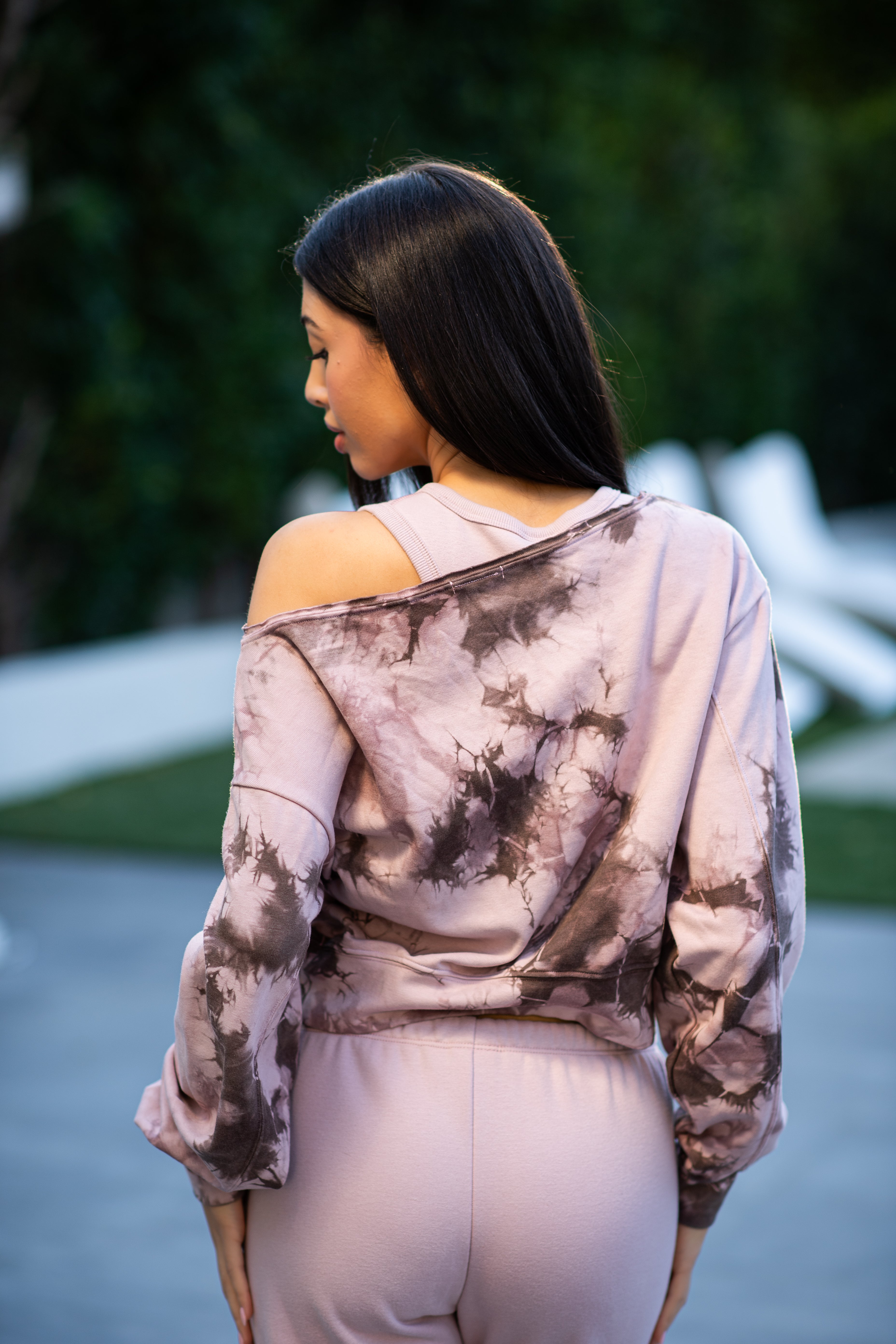 Rib off the shoulder long sleeve in dusty pink, from the back