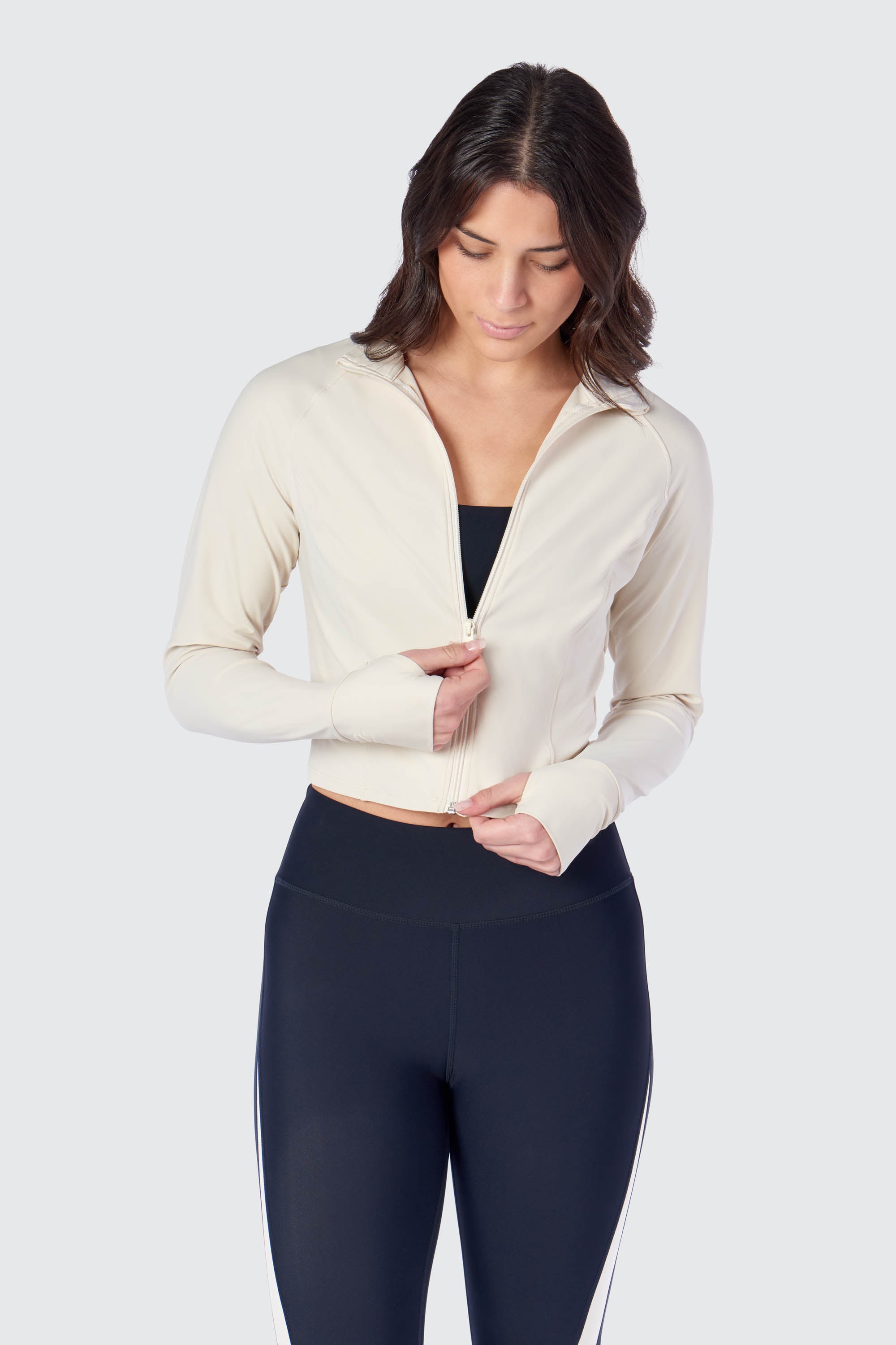 Long sleeve Robyn cropped jacket with thumbholes in Cream, from the front