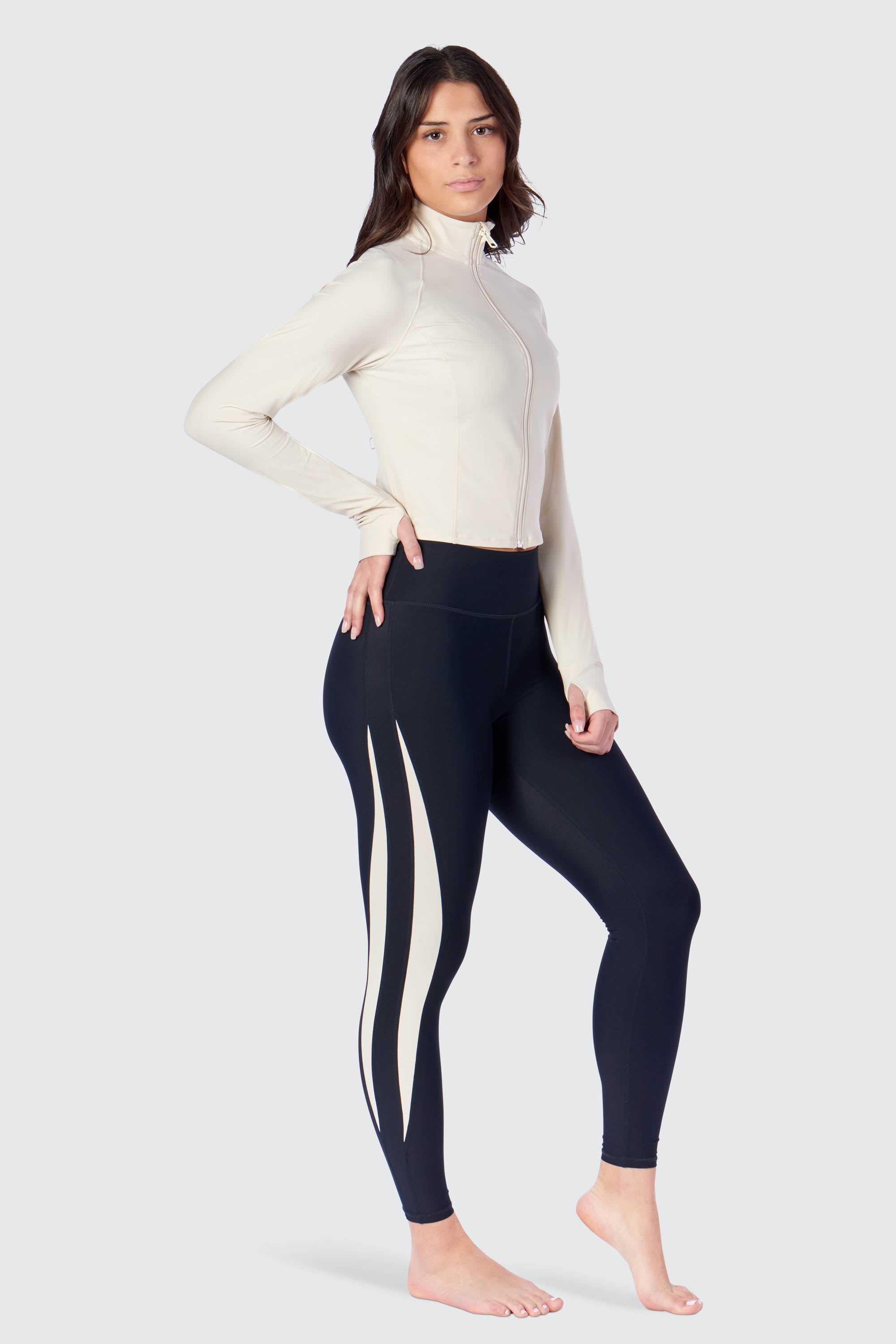 Long sleeve Robyn cropped jacket with thumbholes in cream, from the side
