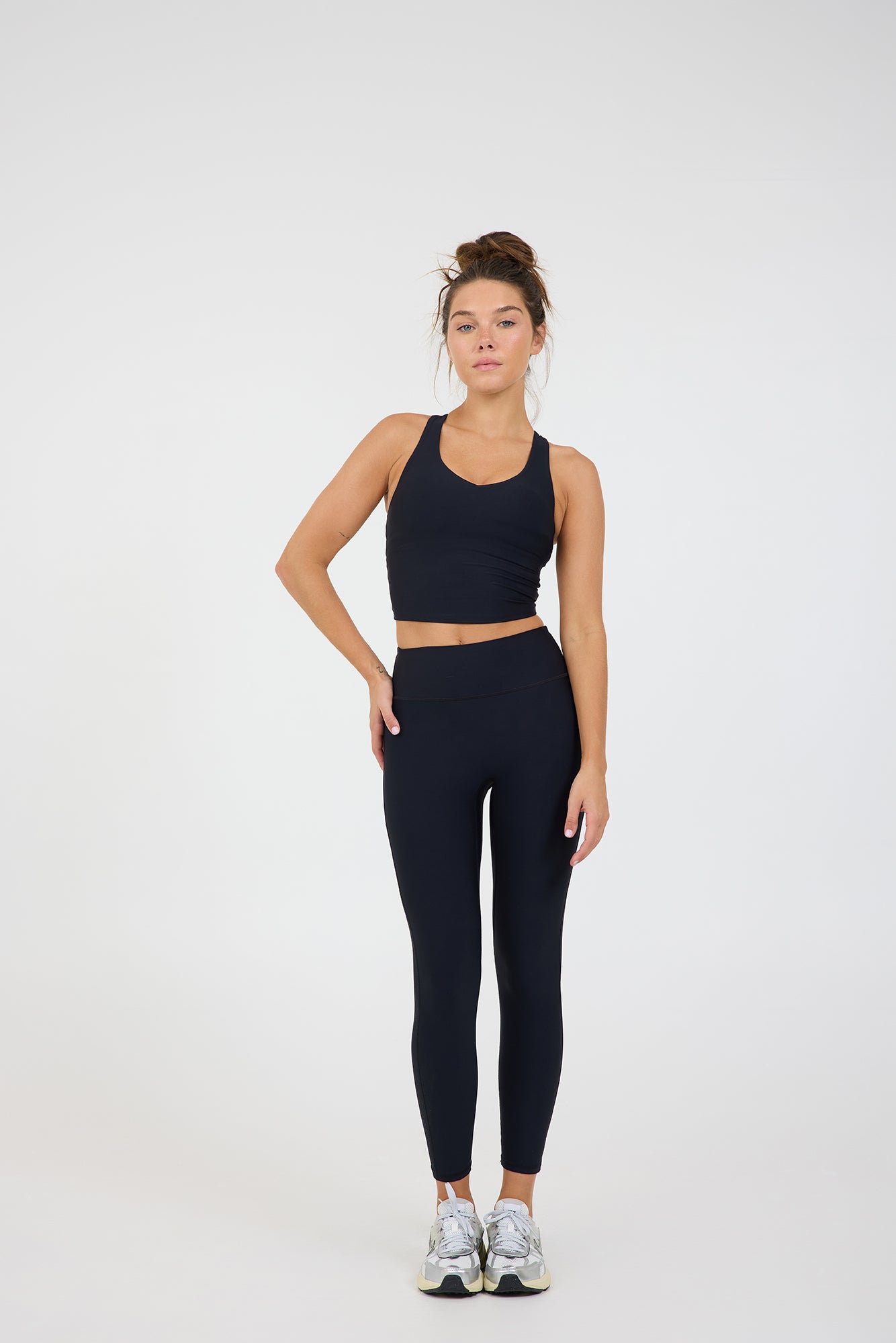 Sweetheart Neckline bra in black, modeled with the Kenzie  7/8 leggings from the front